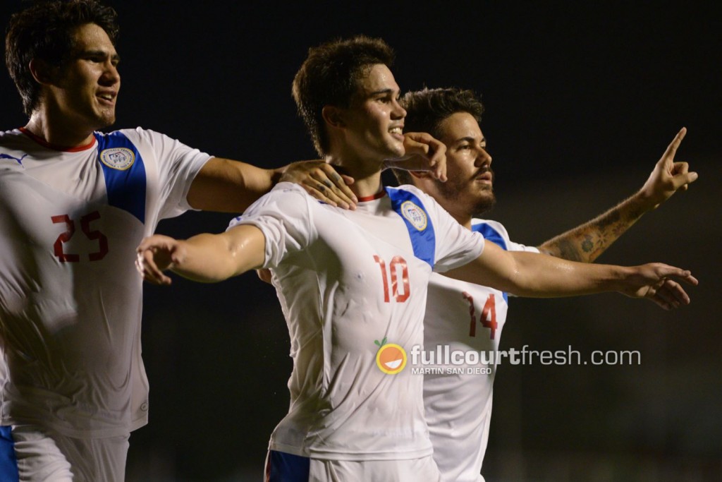 Phil Younghusband celebrates with Mark Hartmann and Carli de Murga after converting a penalty at the 70th minute to put the Azkals up 1-2 against Myanmar. The visitors, however, forced extra time with a last-minute equalizer where Soe Min Oo slipped past the PHL defense in the 100th minute to beat the hosts 3-2 in the 2014 Peace Cup. Photo by Martin San Diego